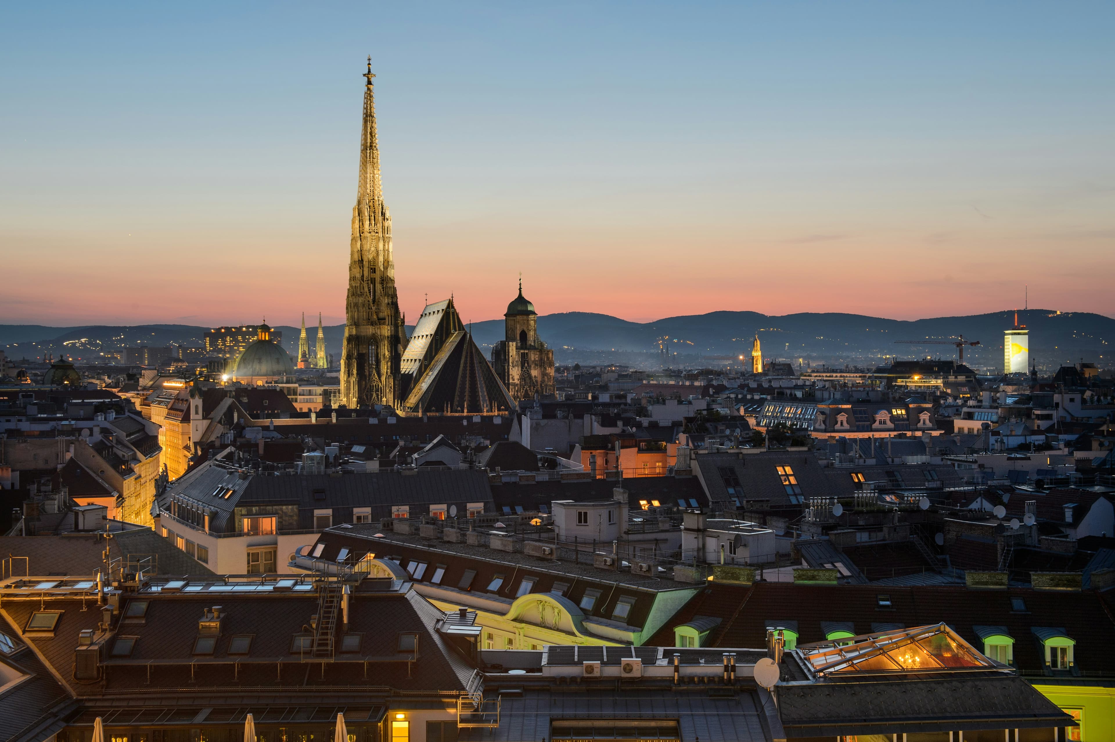 St. Stephen's Cathedral rising above the rooftops of Vienna at golden hour